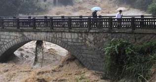 China: 42 dead, 36 missing in rains, flood